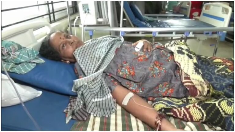 Renukamma sitting with family after returning to life from diabetic coma in Haveri